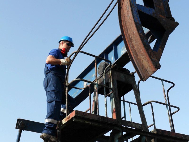 man climbing on metal structure