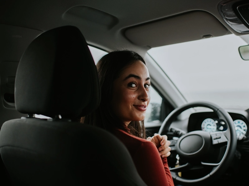 woman in a new car