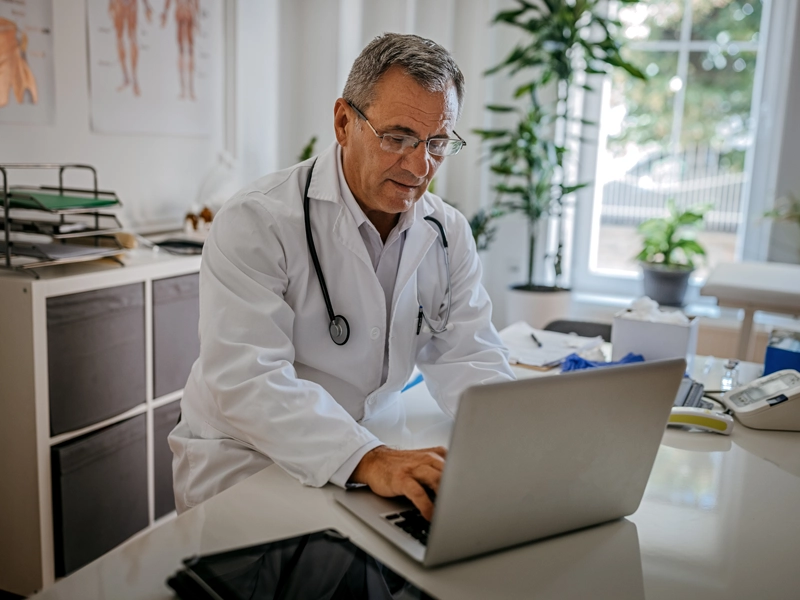 doctor on laptop