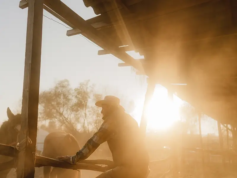 man standing on porch